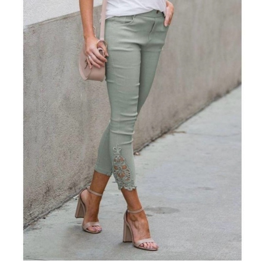 New  Sage green crochet stretch jean leggings. They have never been worn .